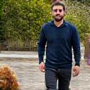 Marcelo P. with his poodle, Bella.